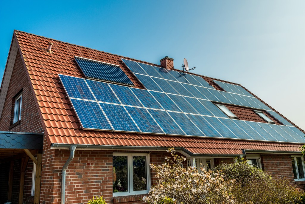 Solar panel on a red roof