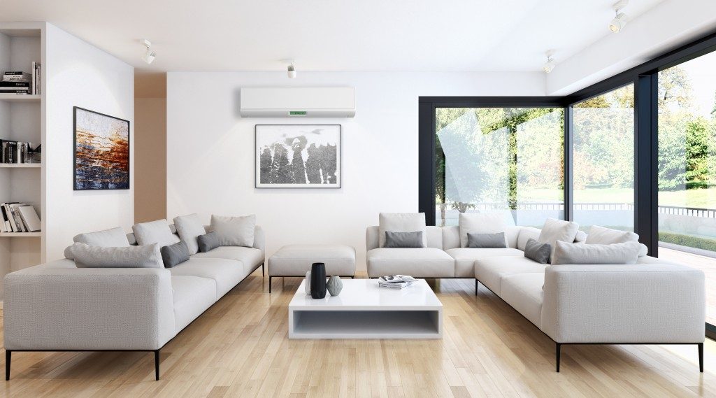 a modern living room design in white, black and brown color interiors