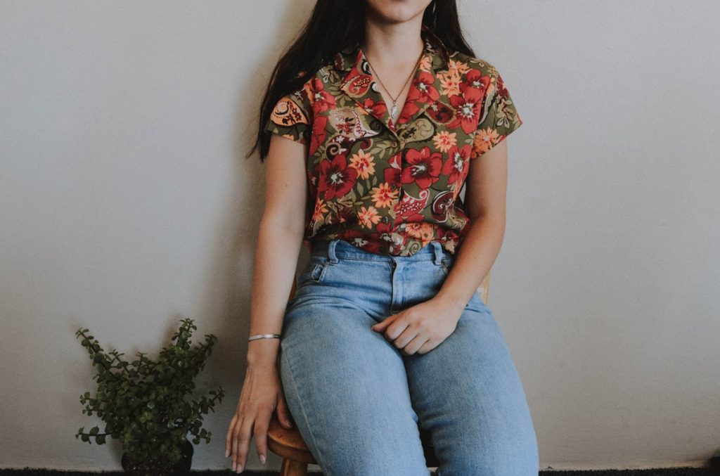 Woman wearing floral printed shirt