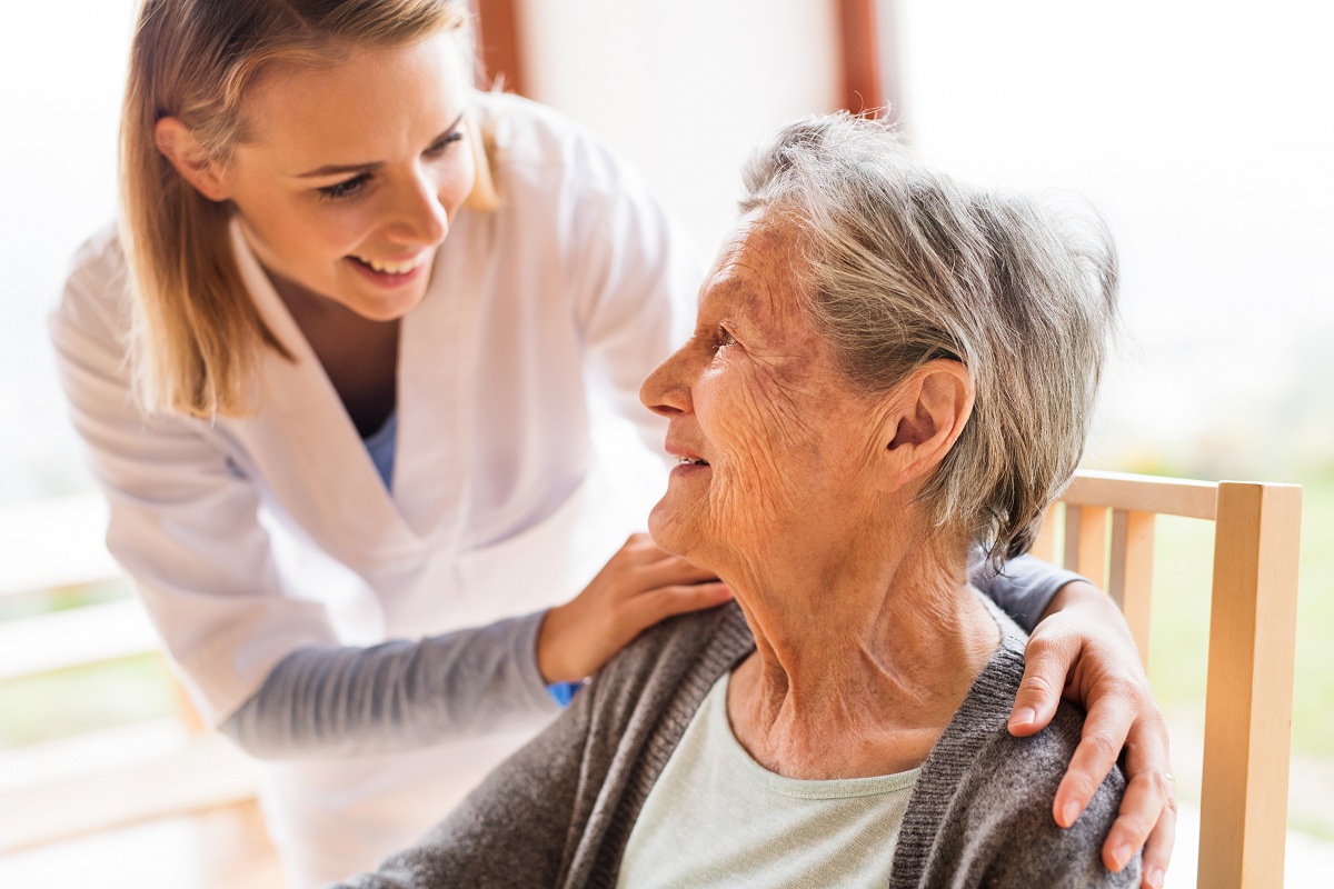 old woman with nurse