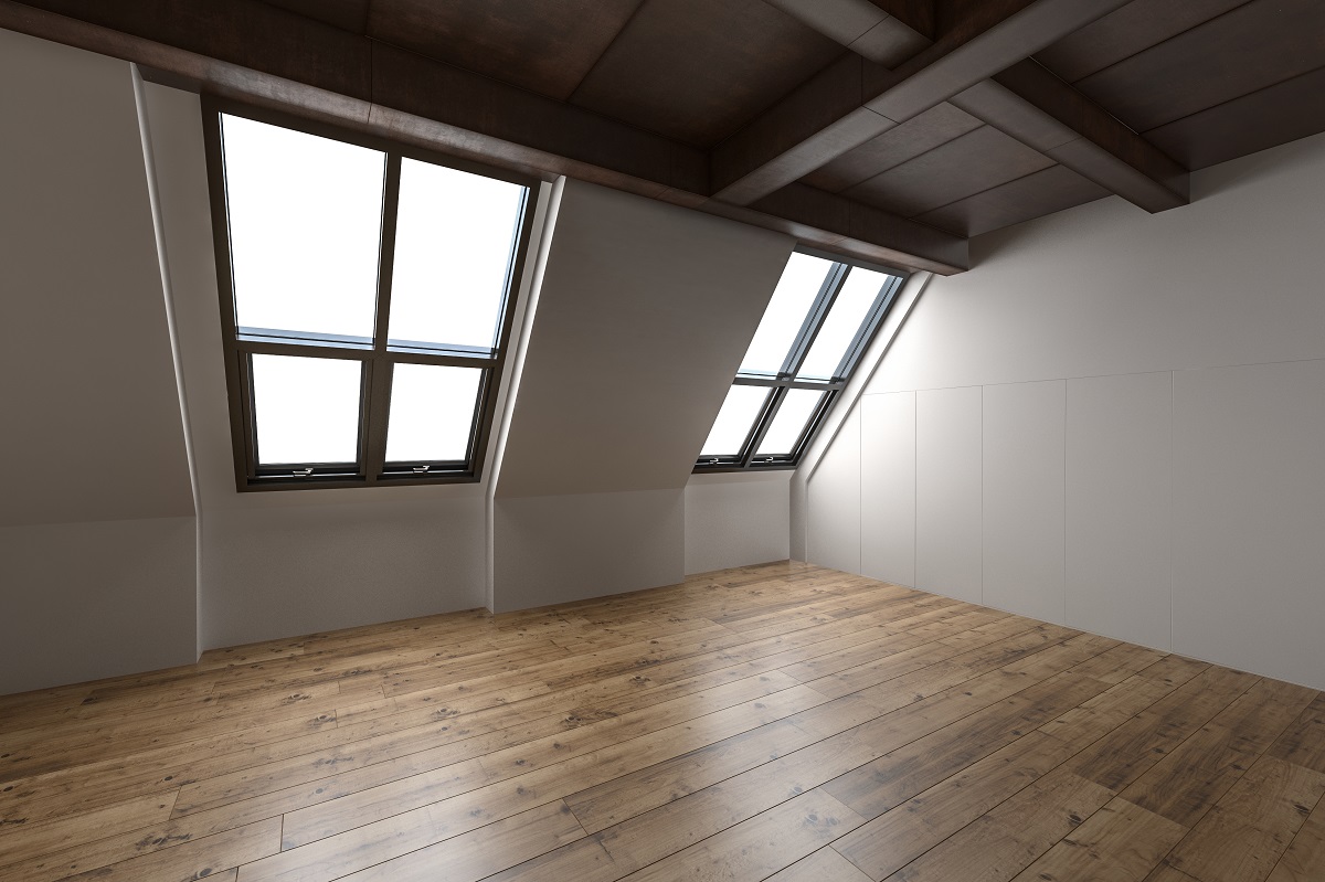 attic with hardwood floors