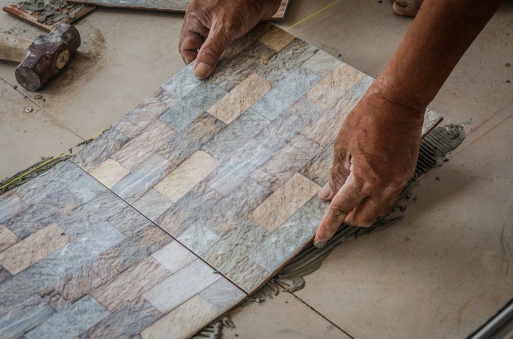 setting down tiles