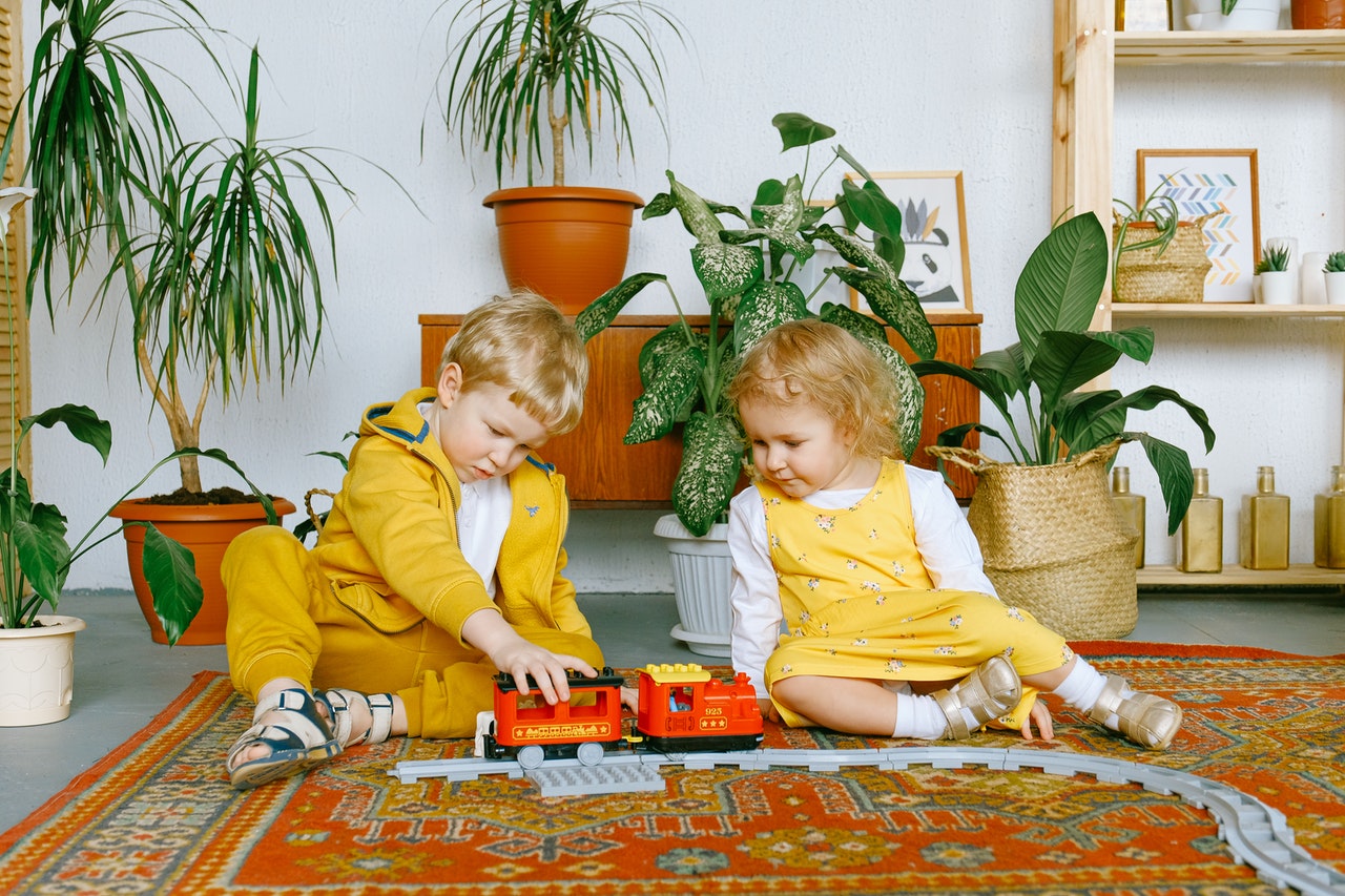 kids playing on the rug