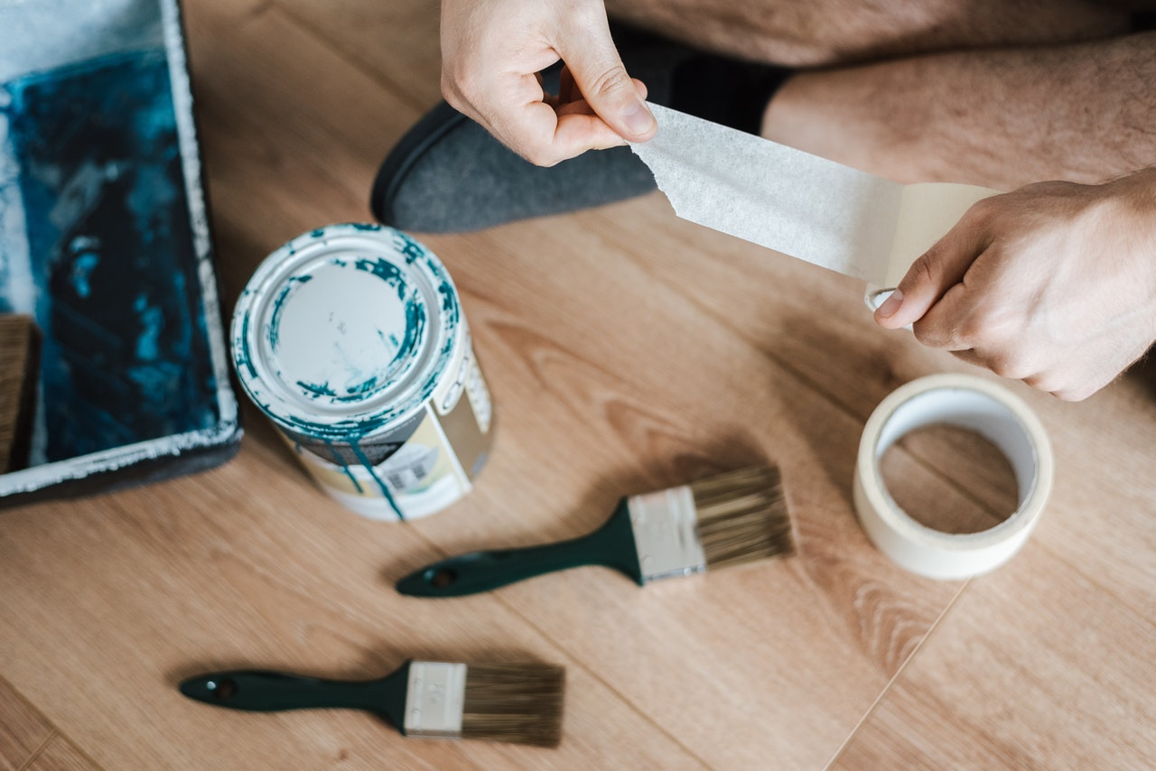 man with painting materials