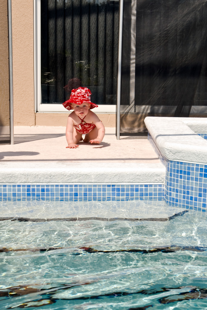 toddler near a pool