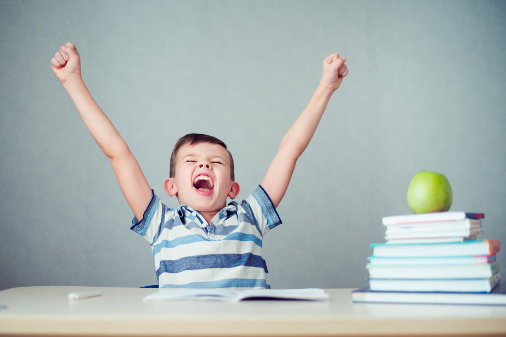 child cheering