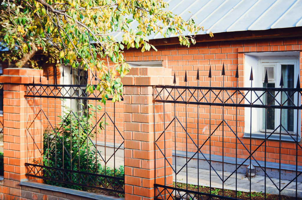 A sturdy fence around a home