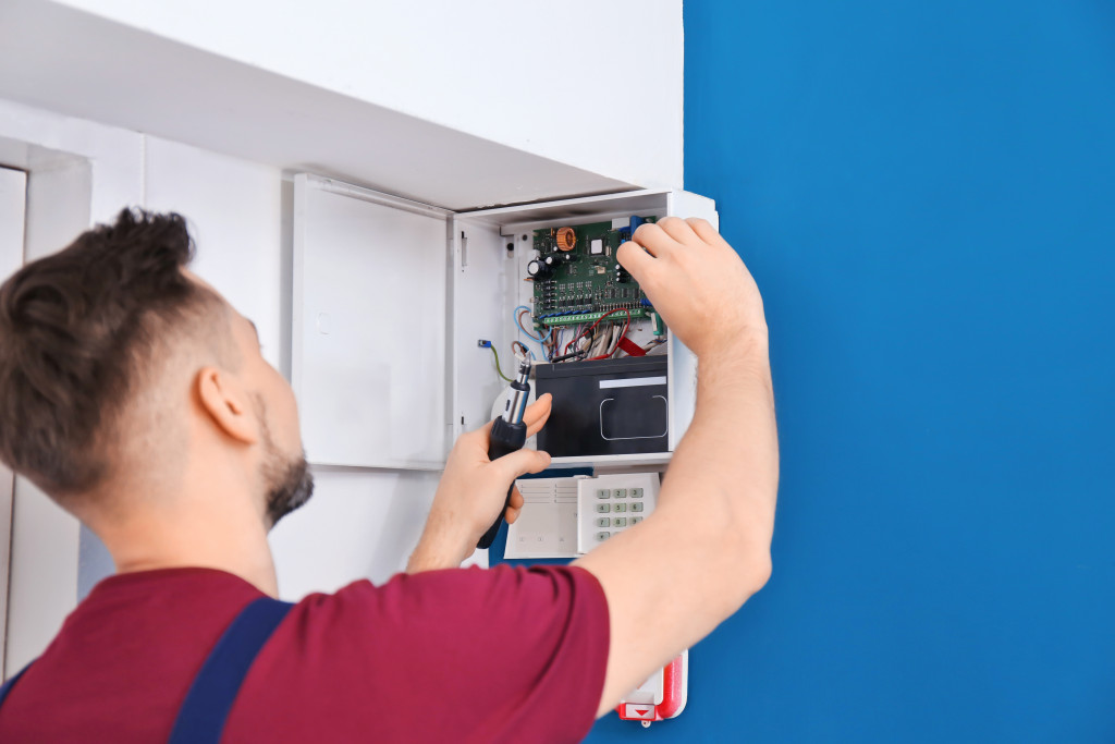 a professional checking electrical system